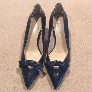 Navy Leather high heeled shoes.